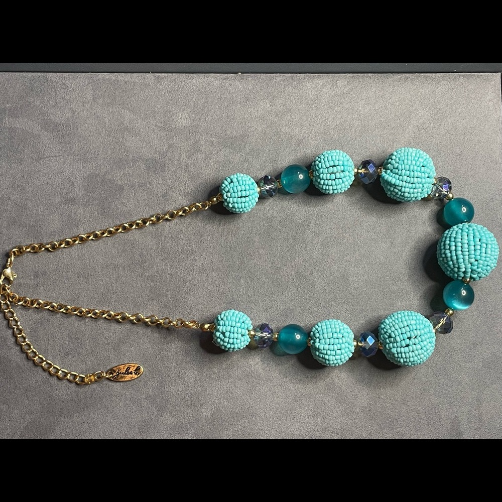 Beautiful costume jewelry necklace with blueish green beads
